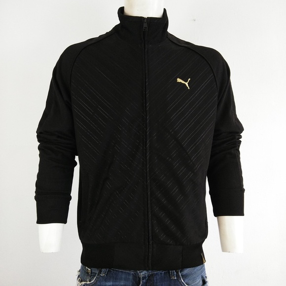 black and gold pumas zip